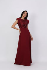 sleeveless gown with sequined bodice and structured cape shoulders – ODD- RELYE