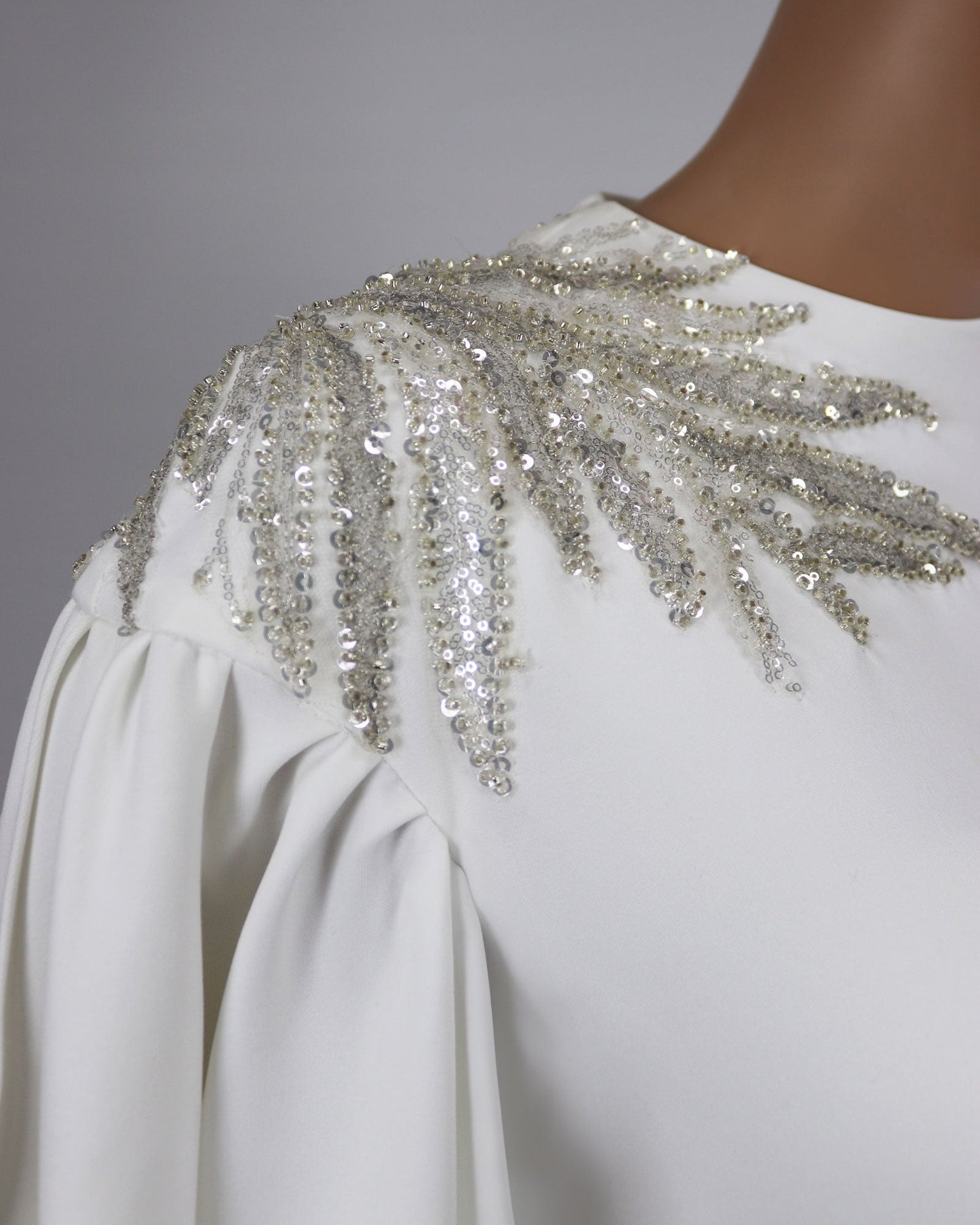 ODD - White column dress with ruffled sleeves and sequined shoulders
