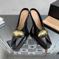 black leather mules with gold oval detail - ODD- LOMA