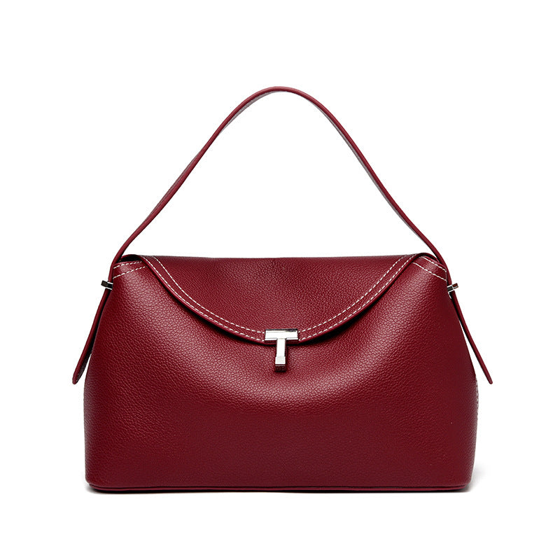 curved flap handbag with contrast stitching – ODD- TESSA