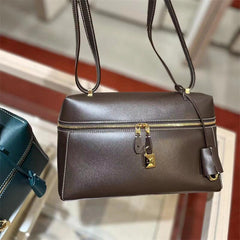 structured leather crossbody with gold lock detail – ODD- VERA