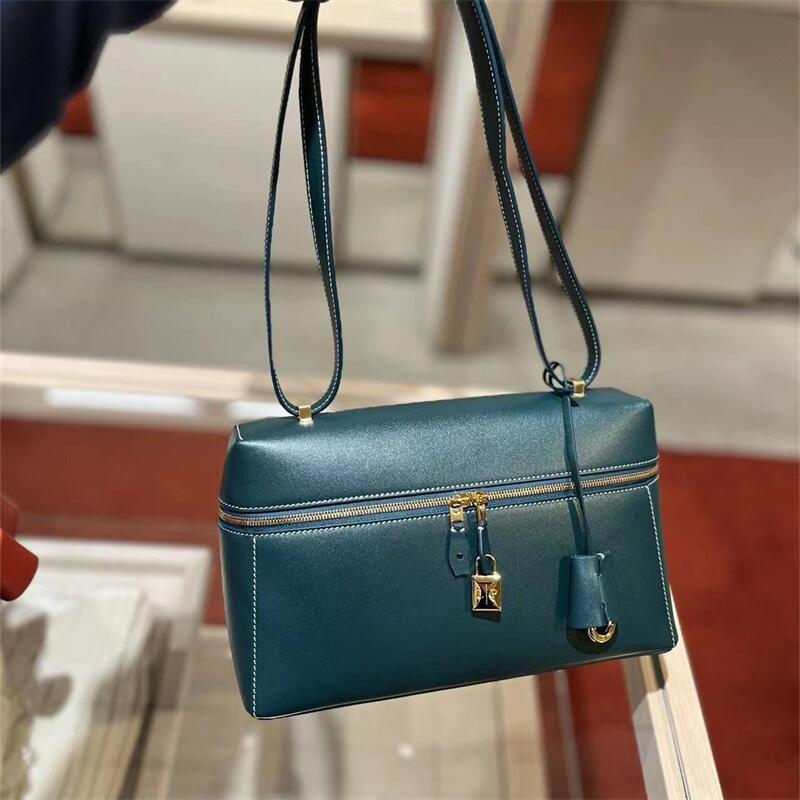 structured leather crossbody with gold lock detail – ODD- VERA