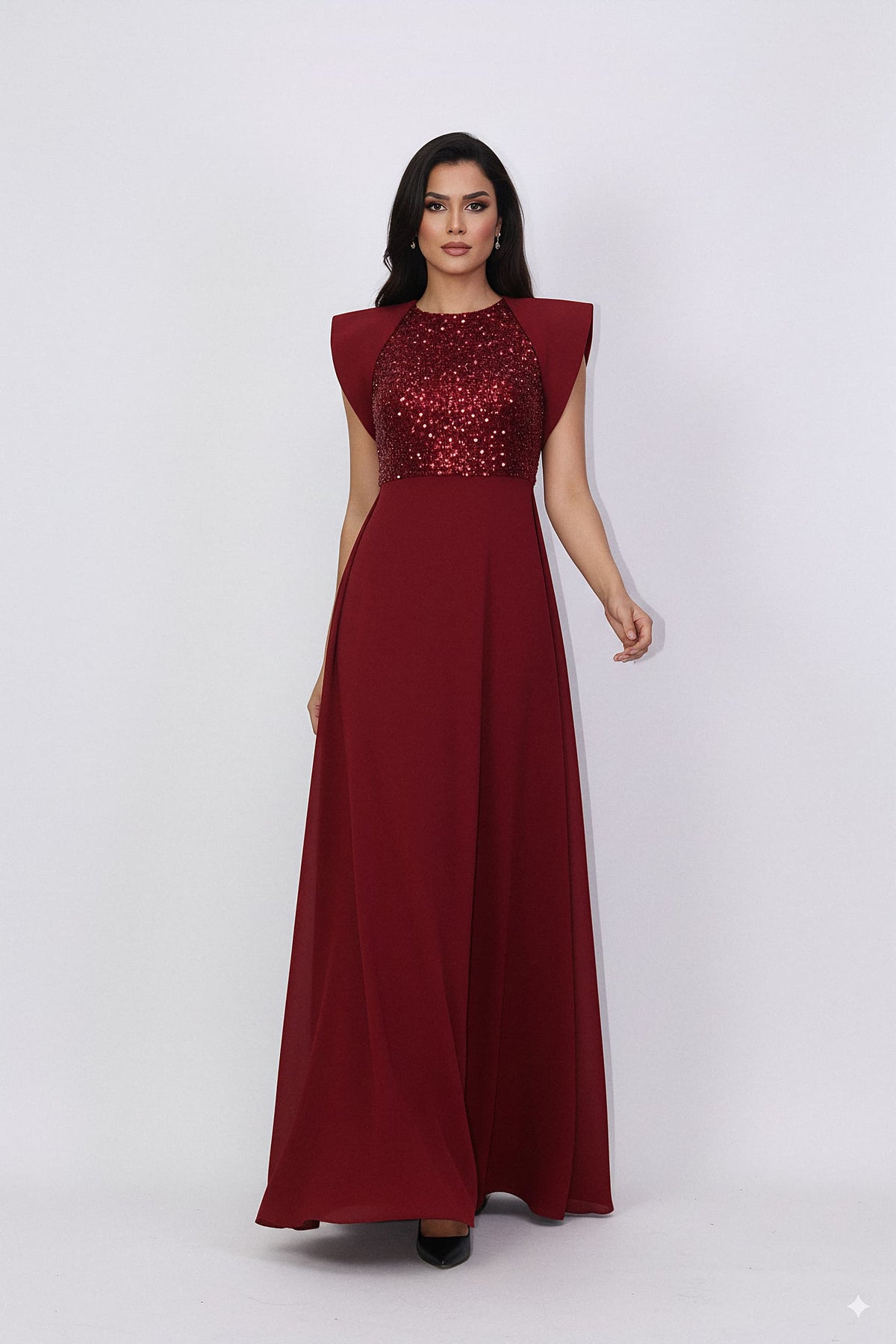 sleeveless gown with sequined bodice and structured cape shoulders – ODD- RELYE